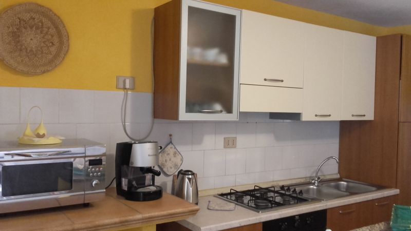 photo 11 Location entre particuliers Porto Pozzo appartement Sardaigne Olbia Tempio (province de) Coin cuisine