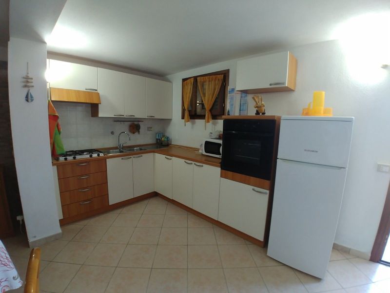 photo 4 Location entre particuliers Capo Comino appartement Sardaigne Nuoro (province de) Salle  manger