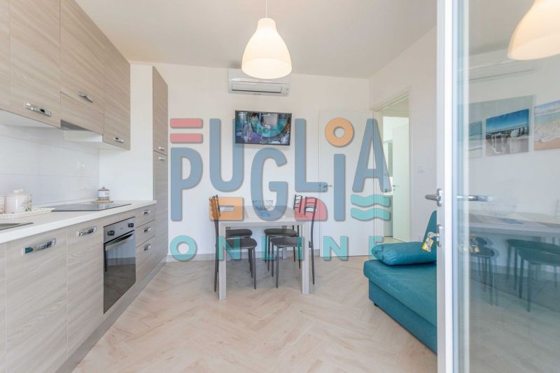 photo 4 Location entre particuliers Pescoluse appartement Pouilles Lecce (province de) Salle  manger